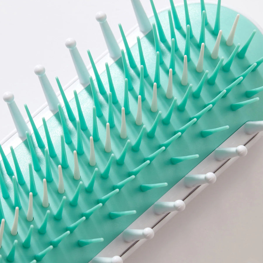 Brosse démêlante pour cheveux épais ou bouclés